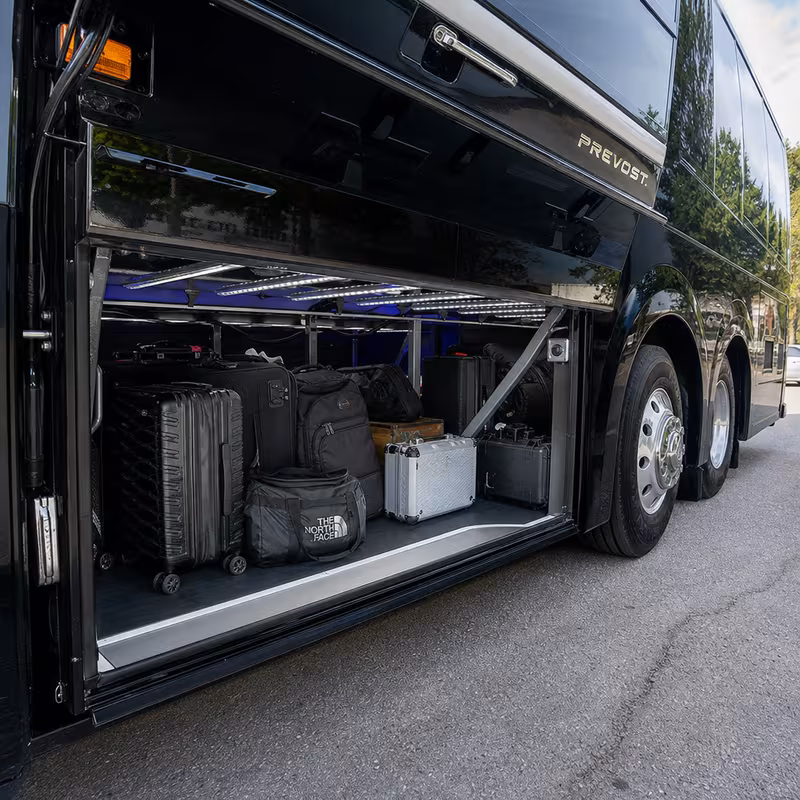 Party bus interior with wraparound leather seating and LED lighting in Pittsburgh